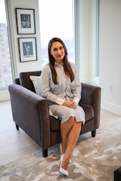 a woman sitting on a chair