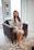 a woman sitting on a chair