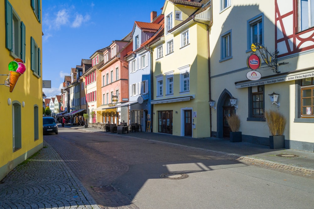 a street with colorful buildings on either side of it