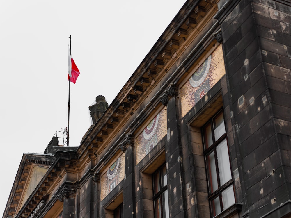 a building with a flag on the roof