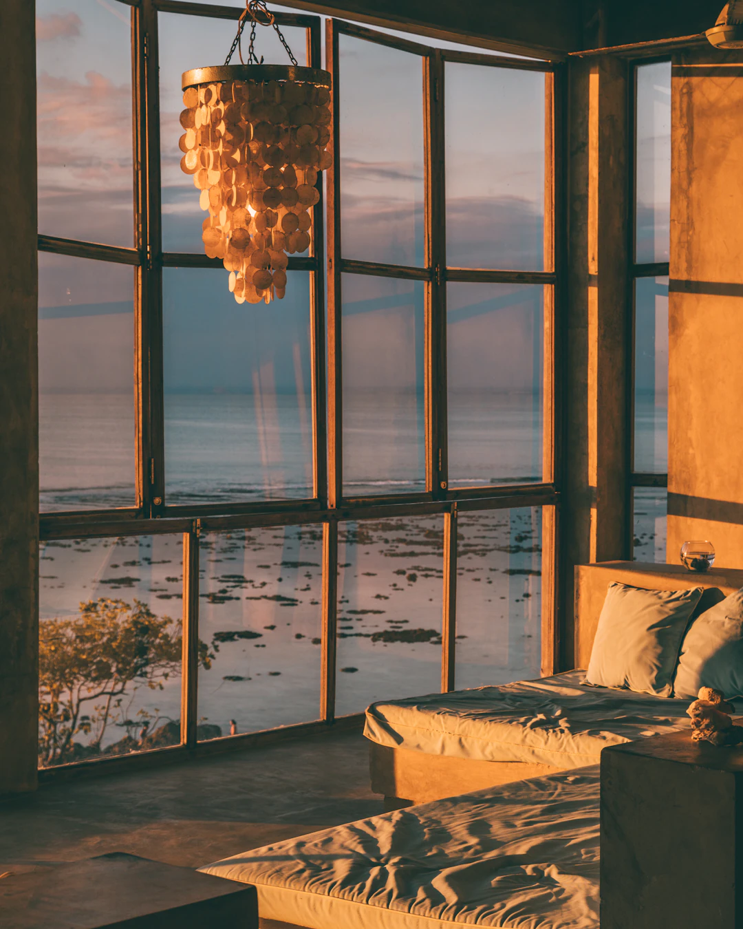 bedroom with a large window, moody, portrait