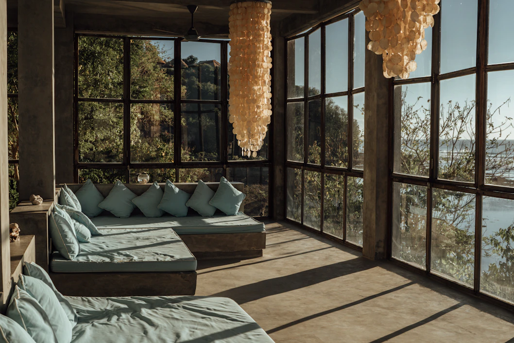 a room with windows and a couch