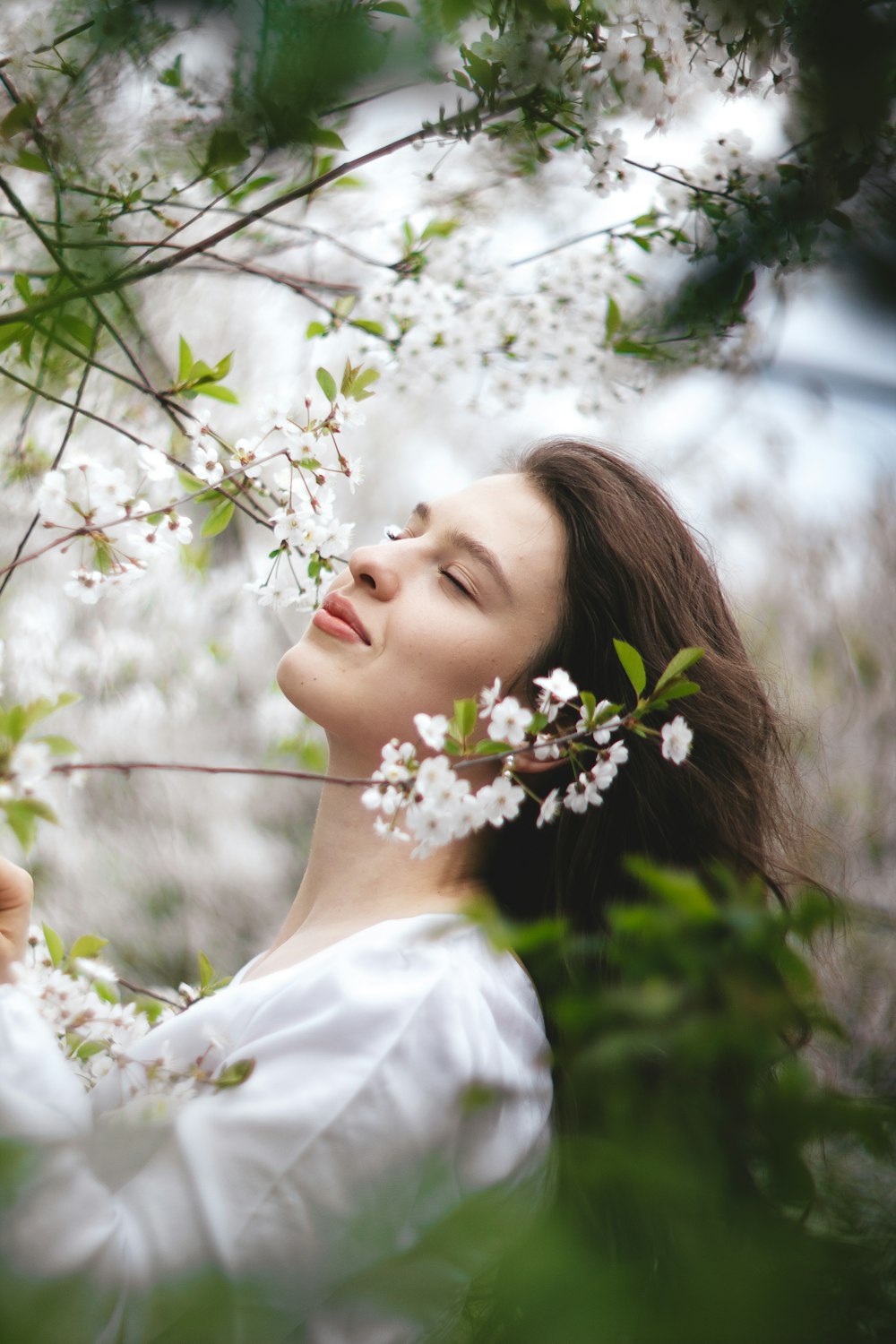 a person lying in a tree