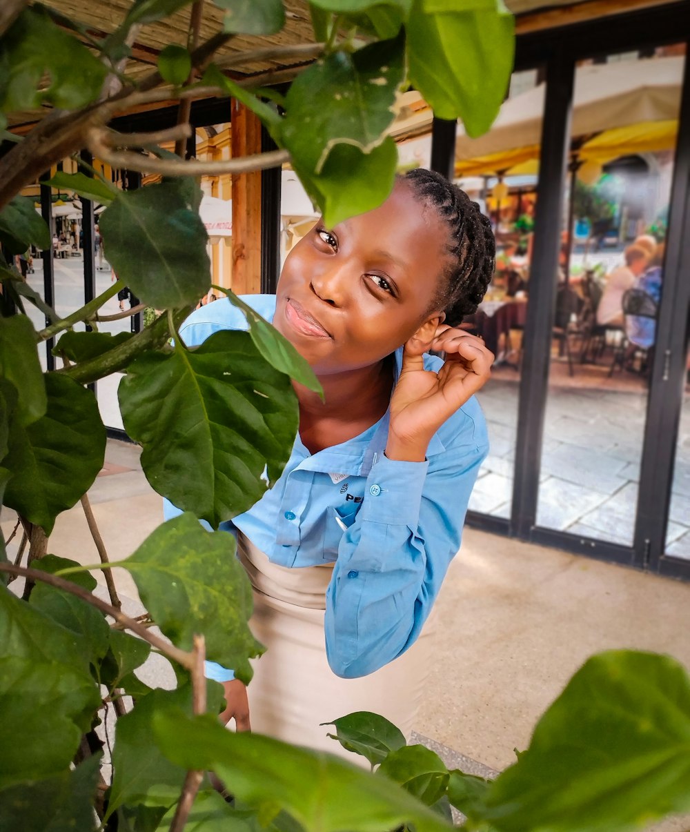 a person holding a plant