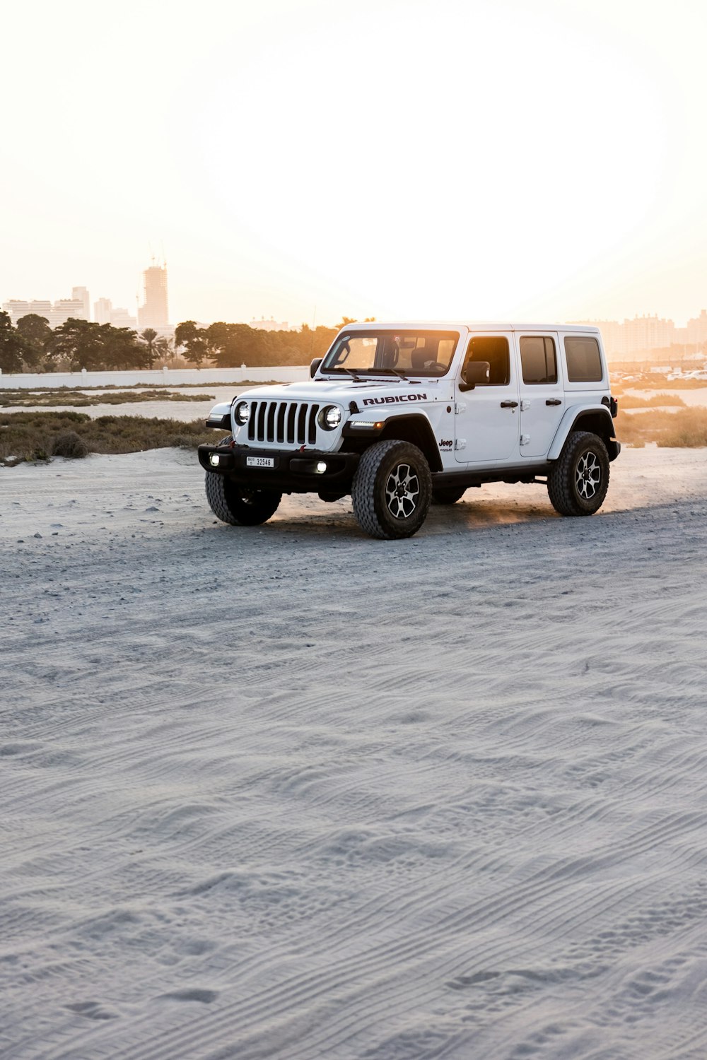 a white truck on a road