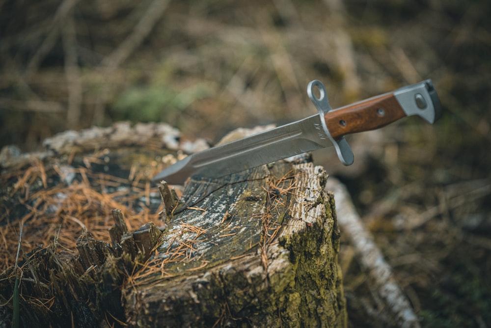 a knife on a tree stump