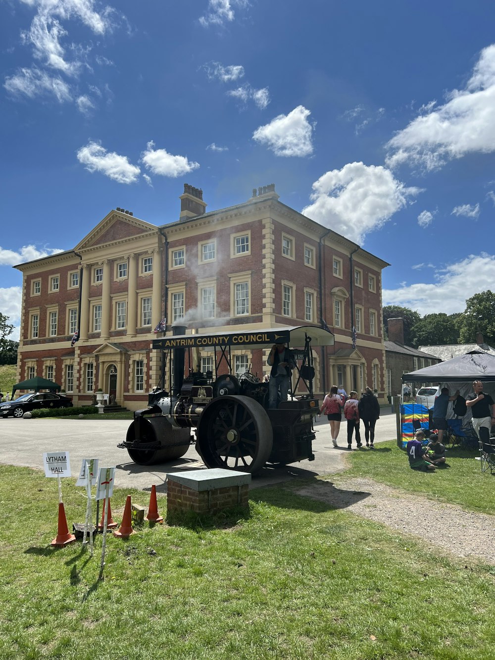 a large building with a cannon in front of it