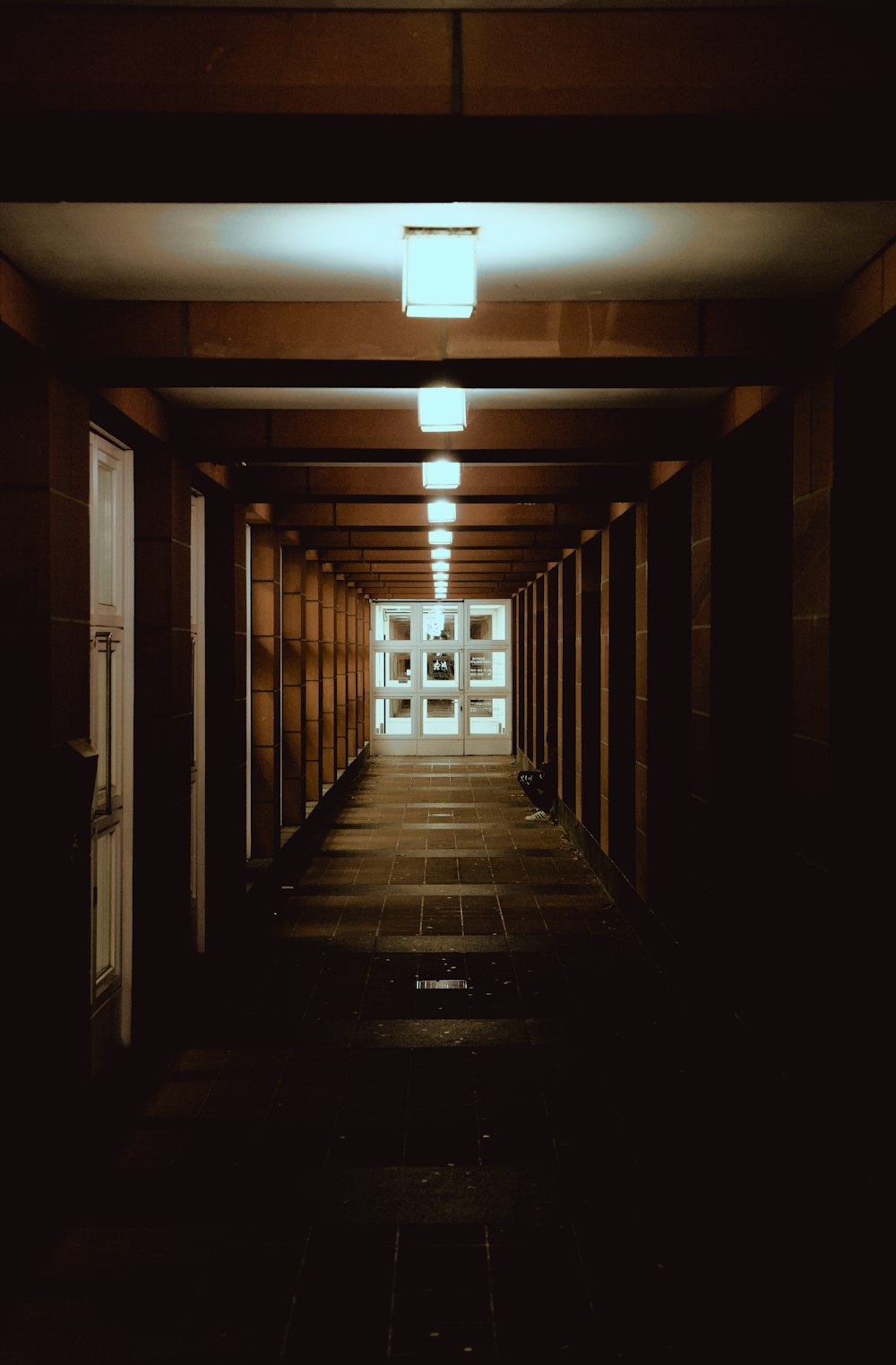 a hallway with a light on