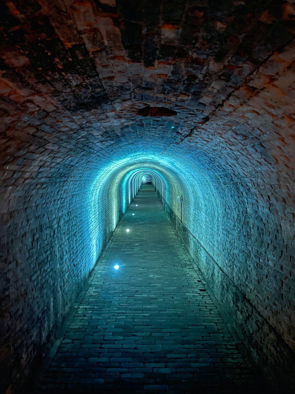 a tunnel with a light at the end