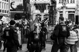 Security personnel managing crowd control at a well-organized event in Berlin.