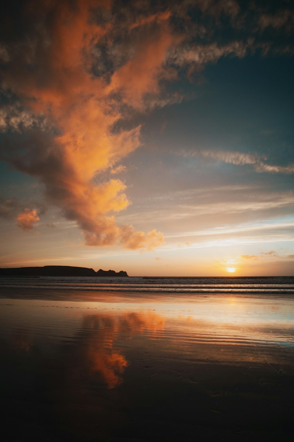 a sunset over a beach