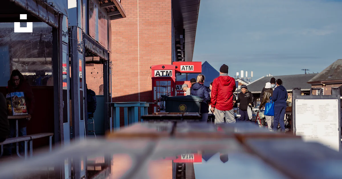A group of people standing on a ramp photo – Free Atm Image on Unsplash