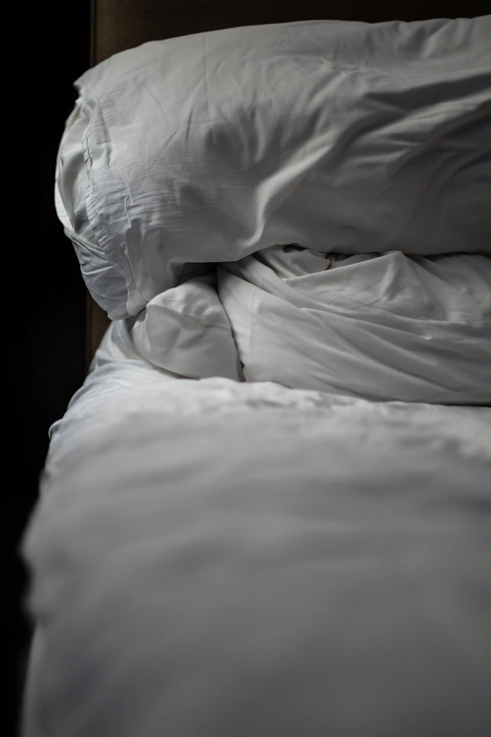 White pillow on a bed