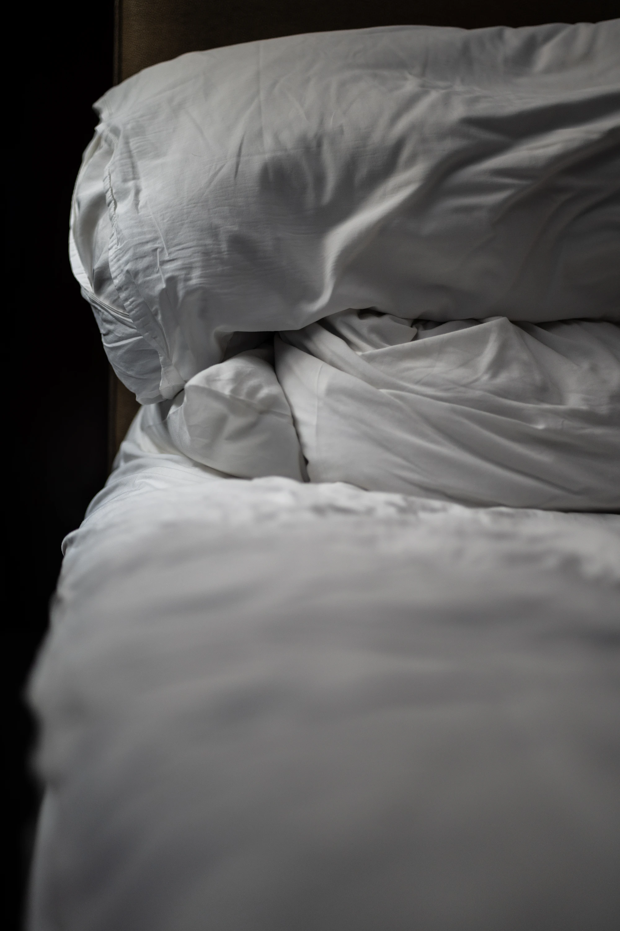 White pillow on a bed