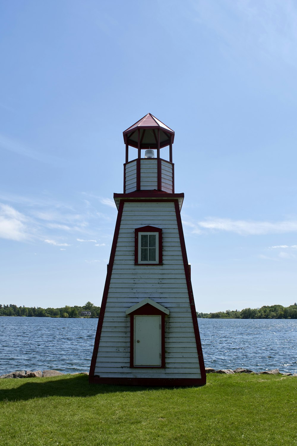 a lighthouse by the water