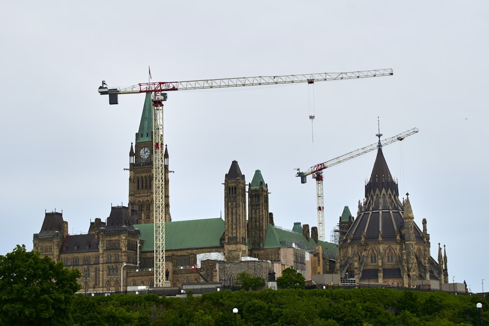 a crane next to a building