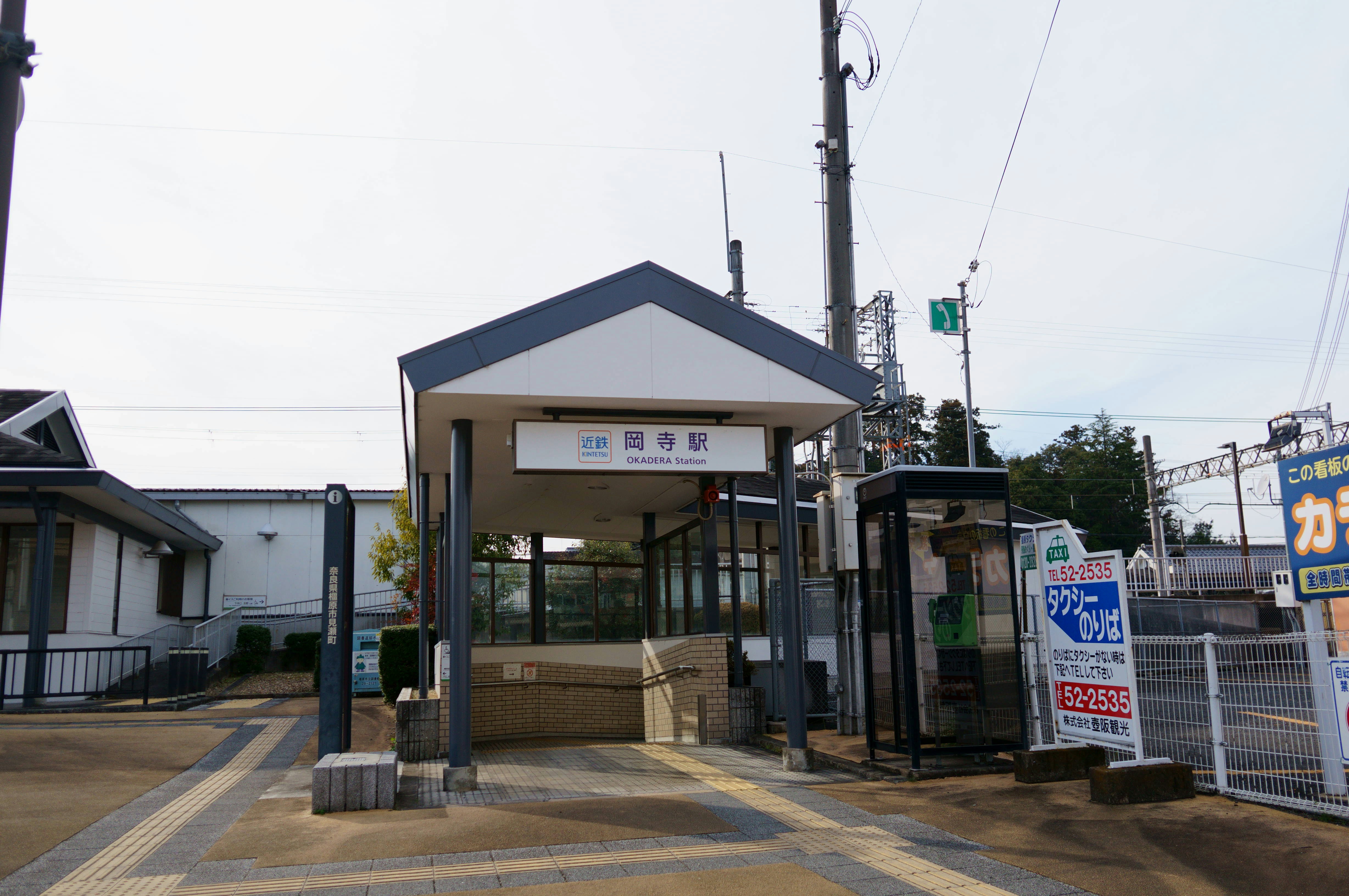 a small building with a fence around it