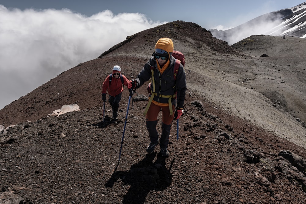 a few hikers on a mountain