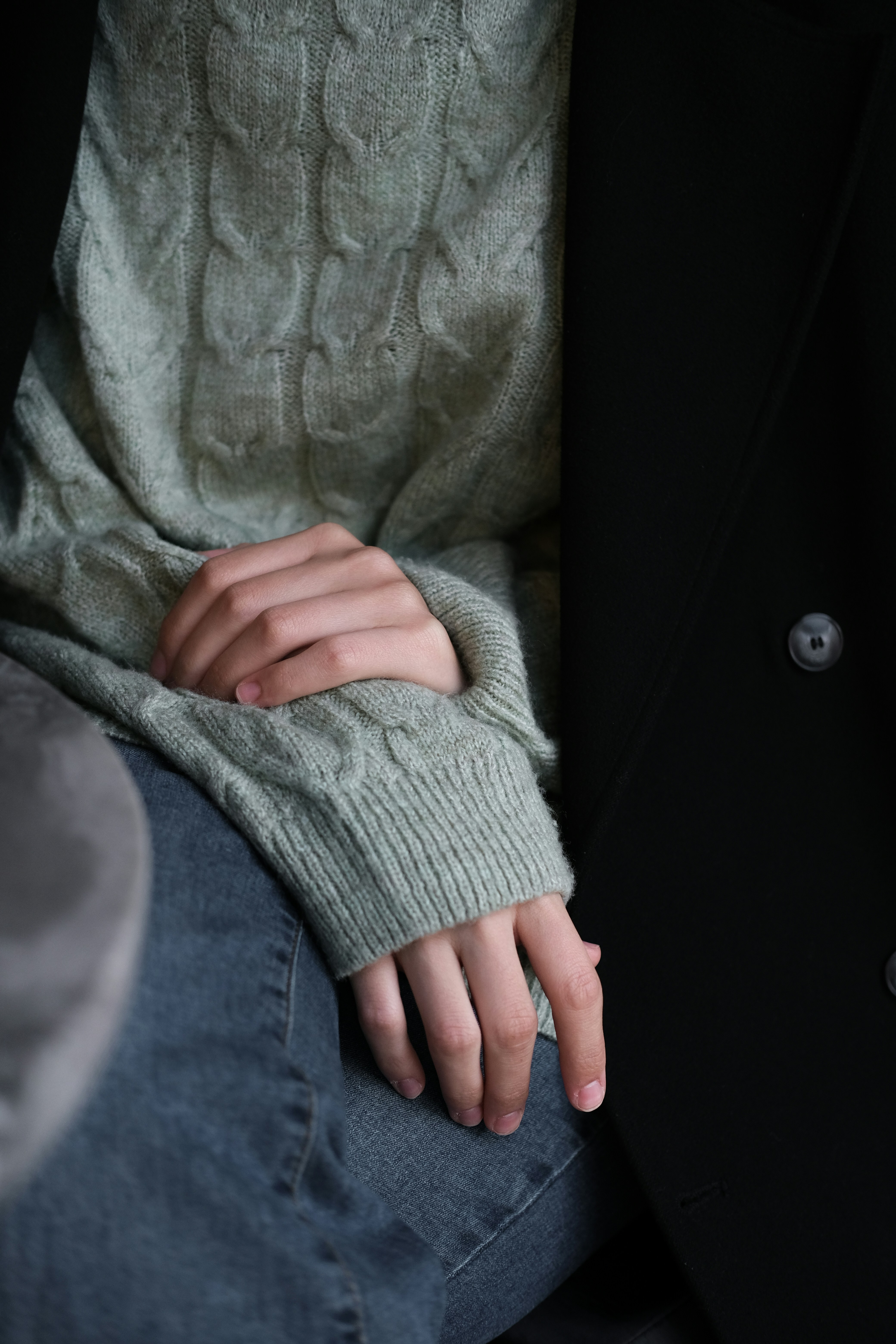 a person holding their hands together