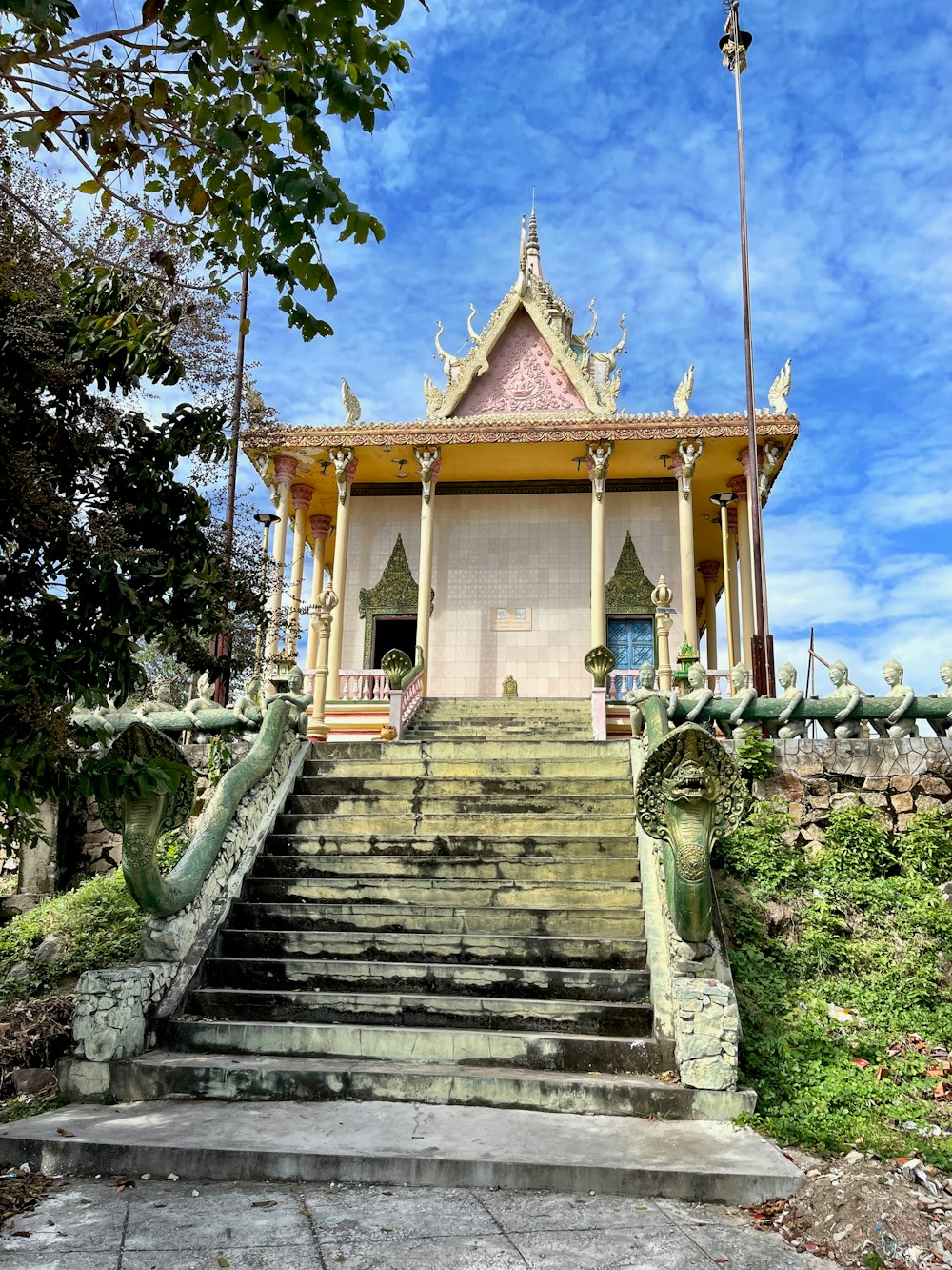 a building with stairs and a tower