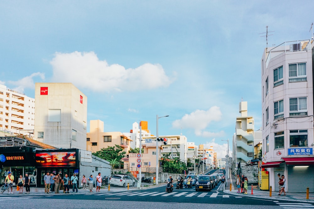 a busy street with people and cars