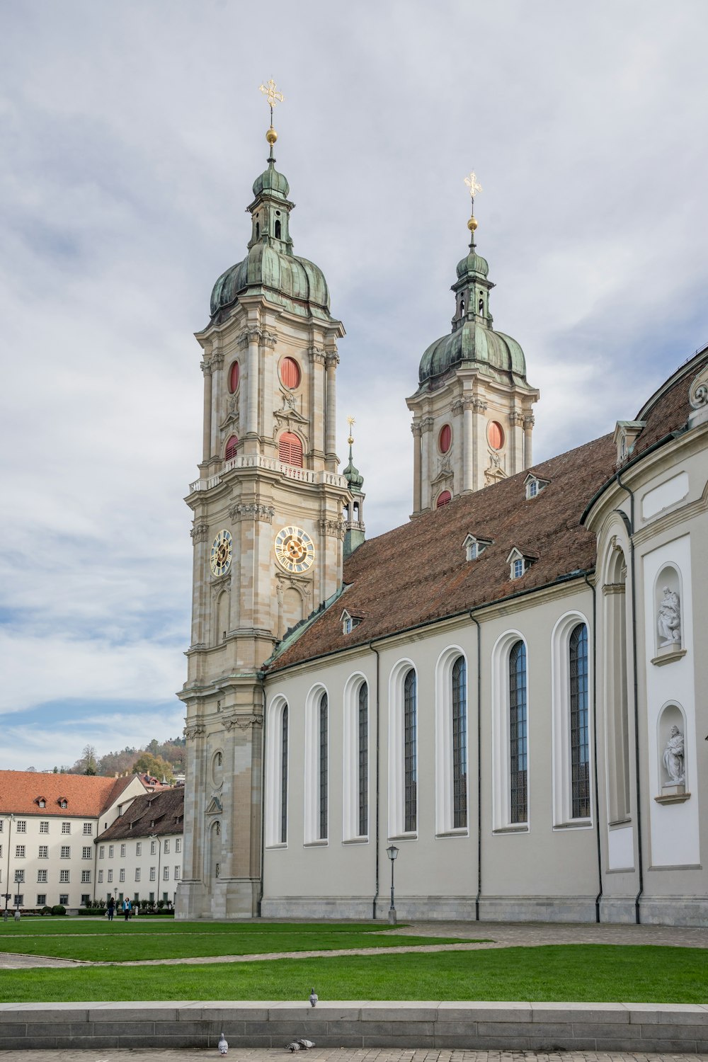 a large building with a clock tower with Charlottenburg Palace in the background