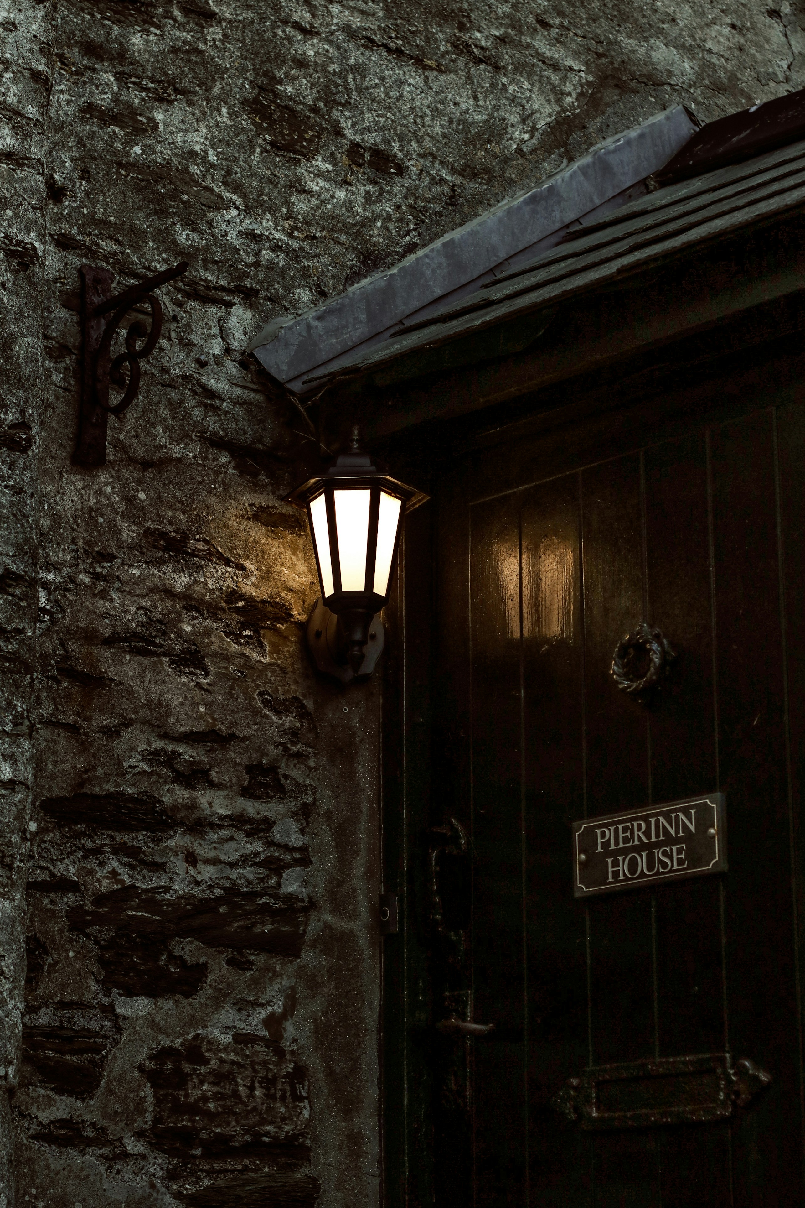 A lamp on a wall photo – Free Lamp Image on Unsplash