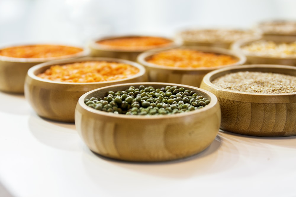 a group of bowls with food in it