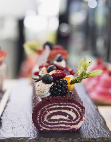 A close-up image of a homemade gluten-free cake roll with natural ingredients.