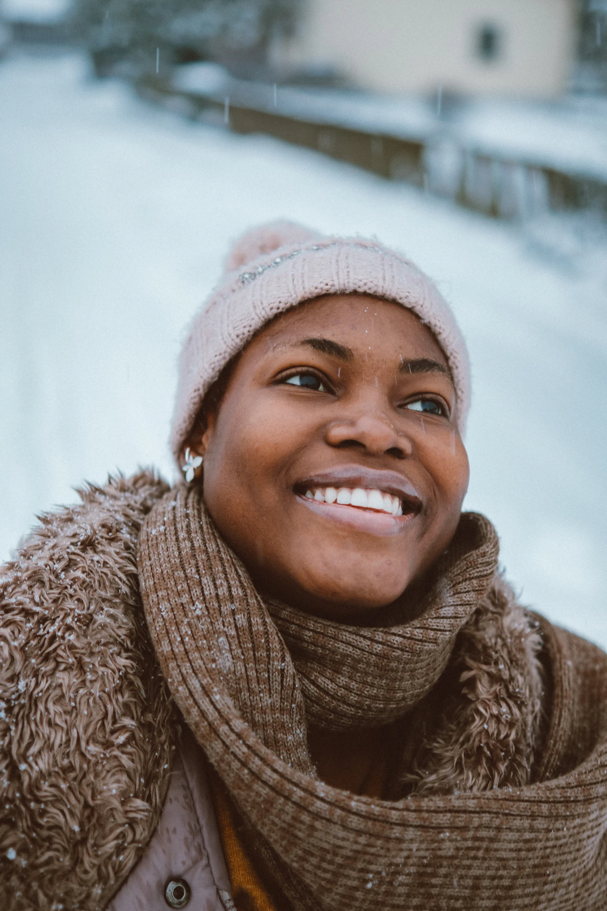 Person bundled up in a scarf during cold winter weather