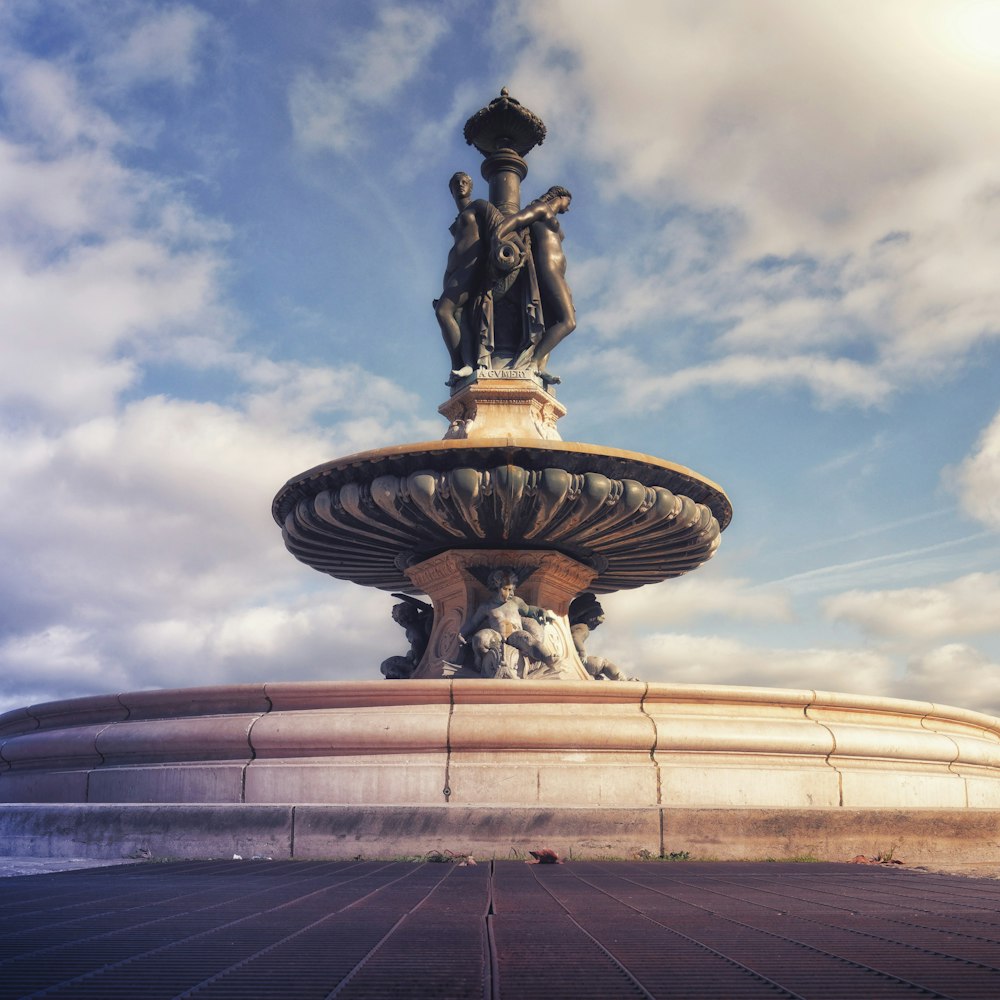 a statue on a fountain