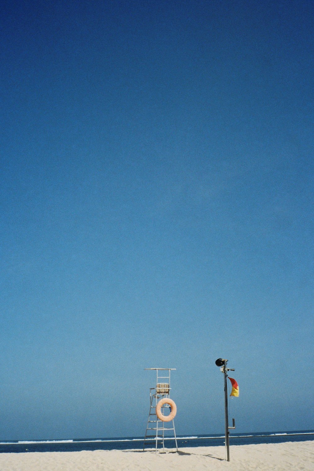 a lifeguard tower on a beach