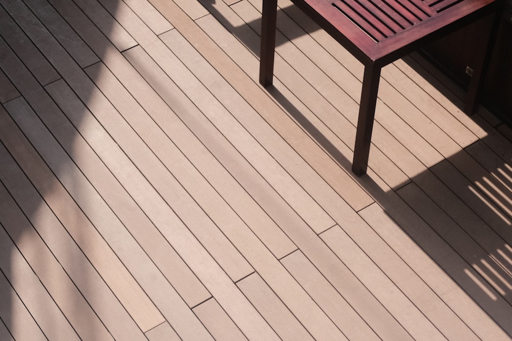 a bench on a wooden deck