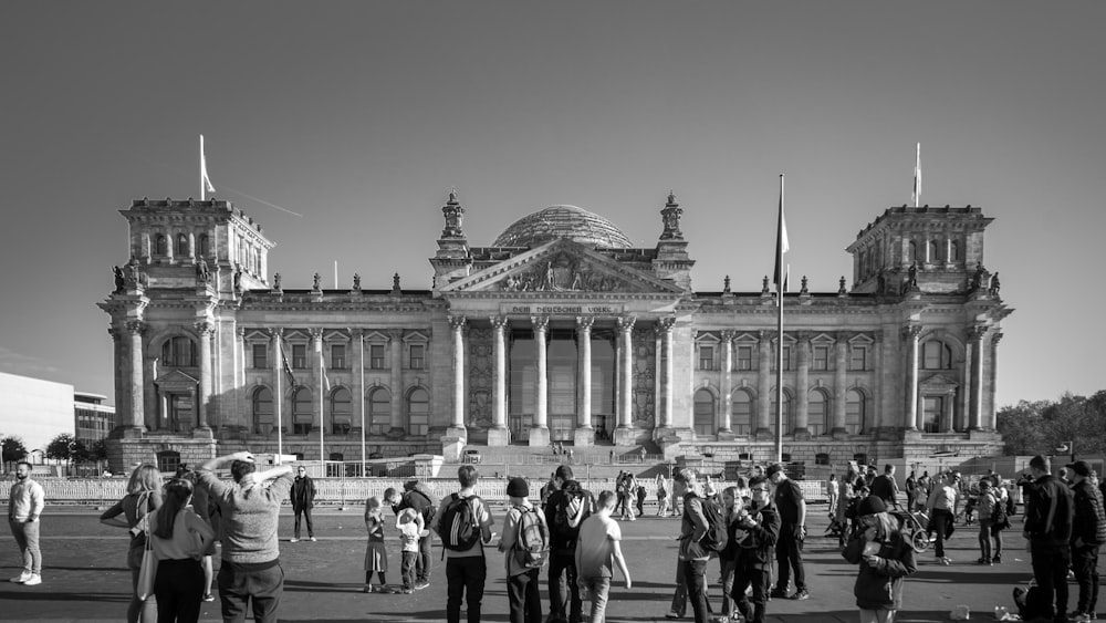 a large group of people outside Reichstag building