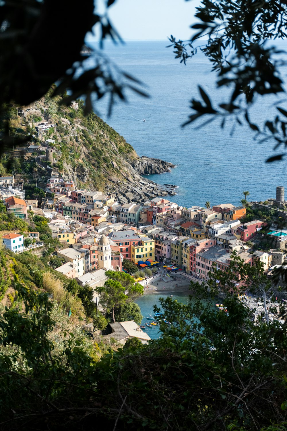 a town on a hill by the water