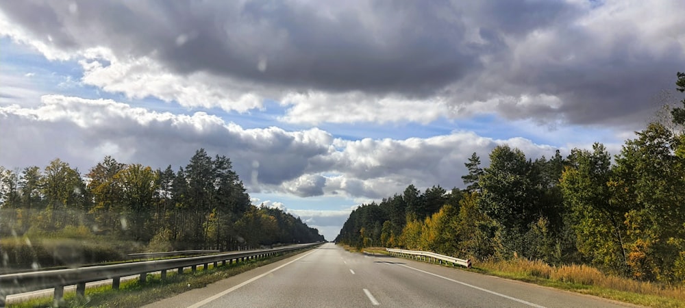 a road with trees on the side