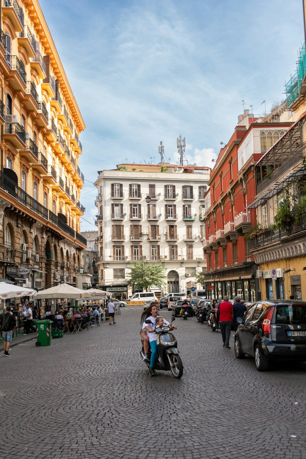 a person on a motorcycle in a city