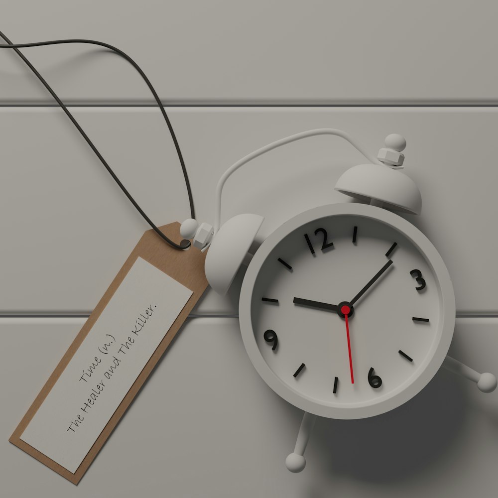 a clock with a note