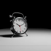 a silver analog clock