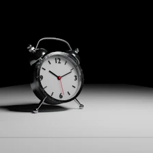 a silver analog clock