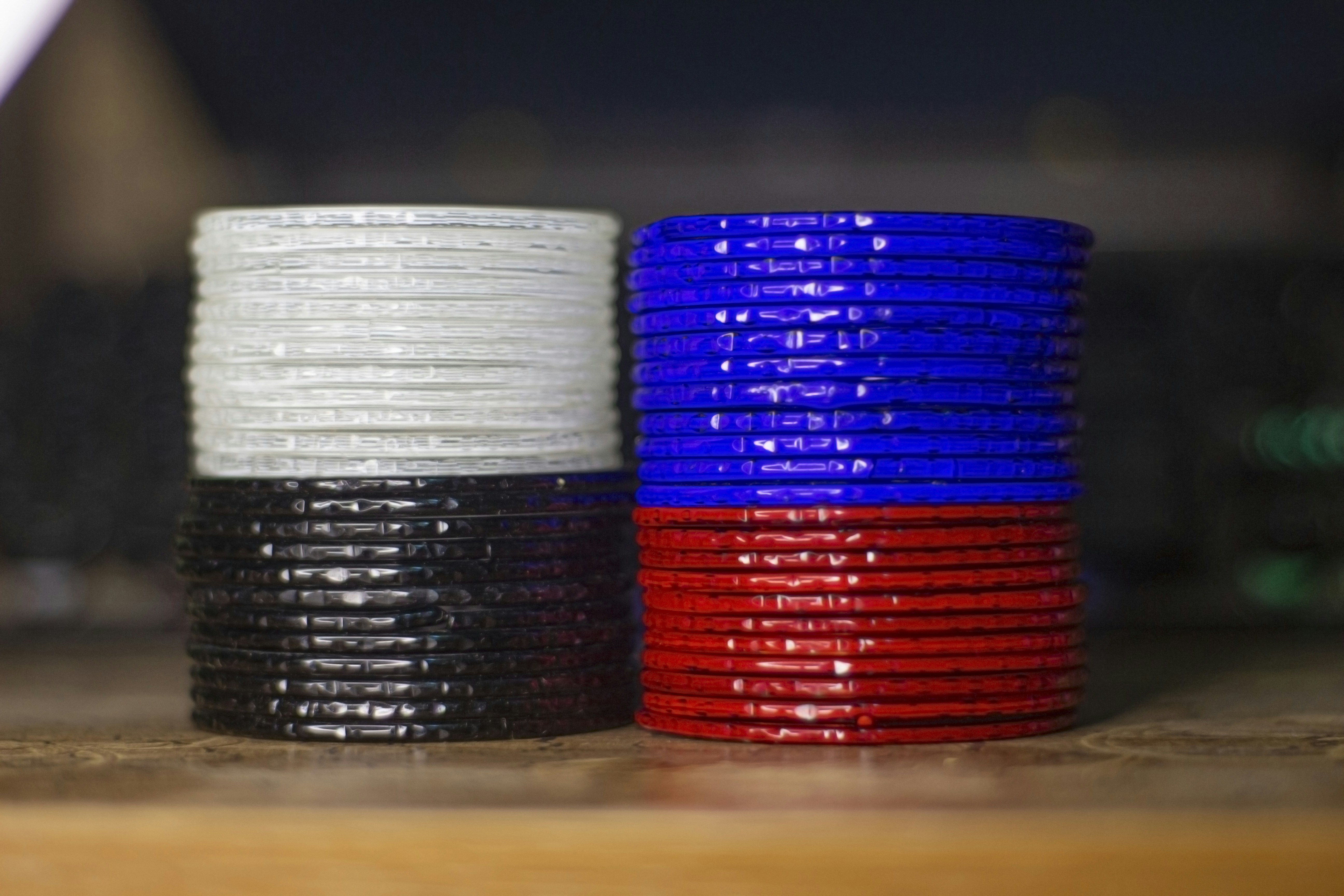 Colourful bangles and bracelets stacked together