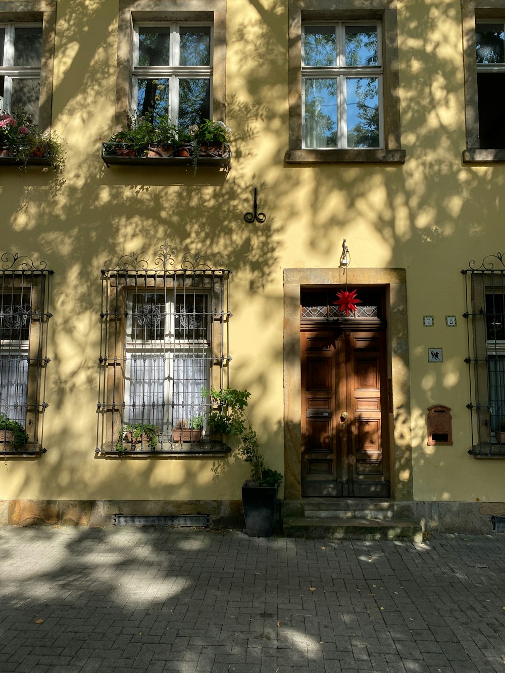 a building with a gate and windows