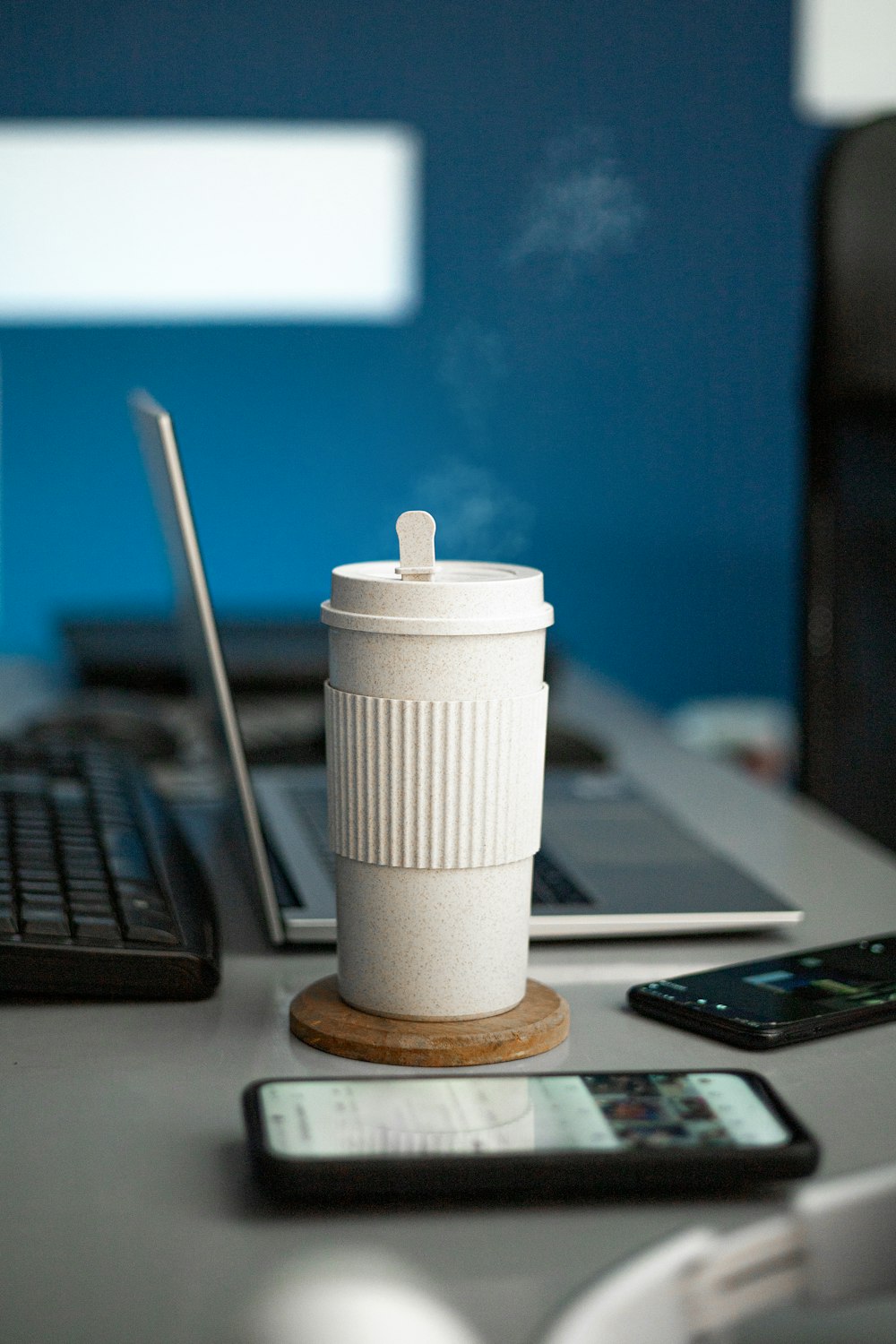 a white cylindrical object on a desk