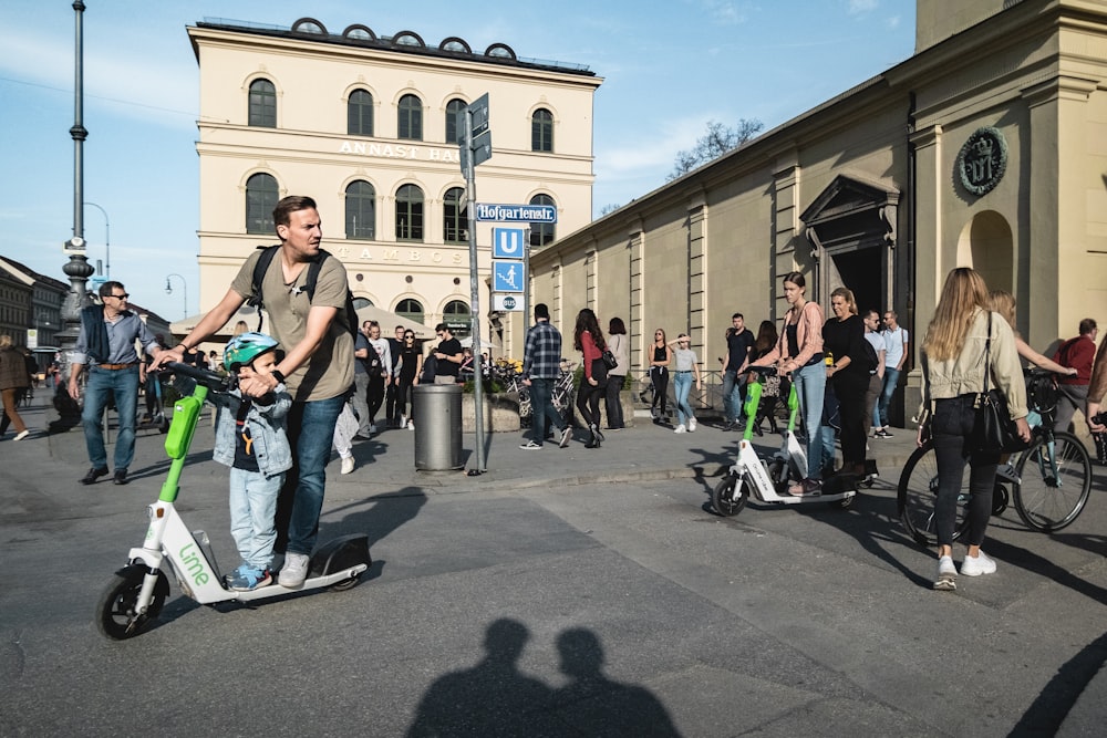 a group of people walking on a street