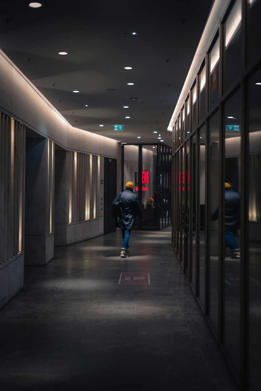 a person walking down a train platform