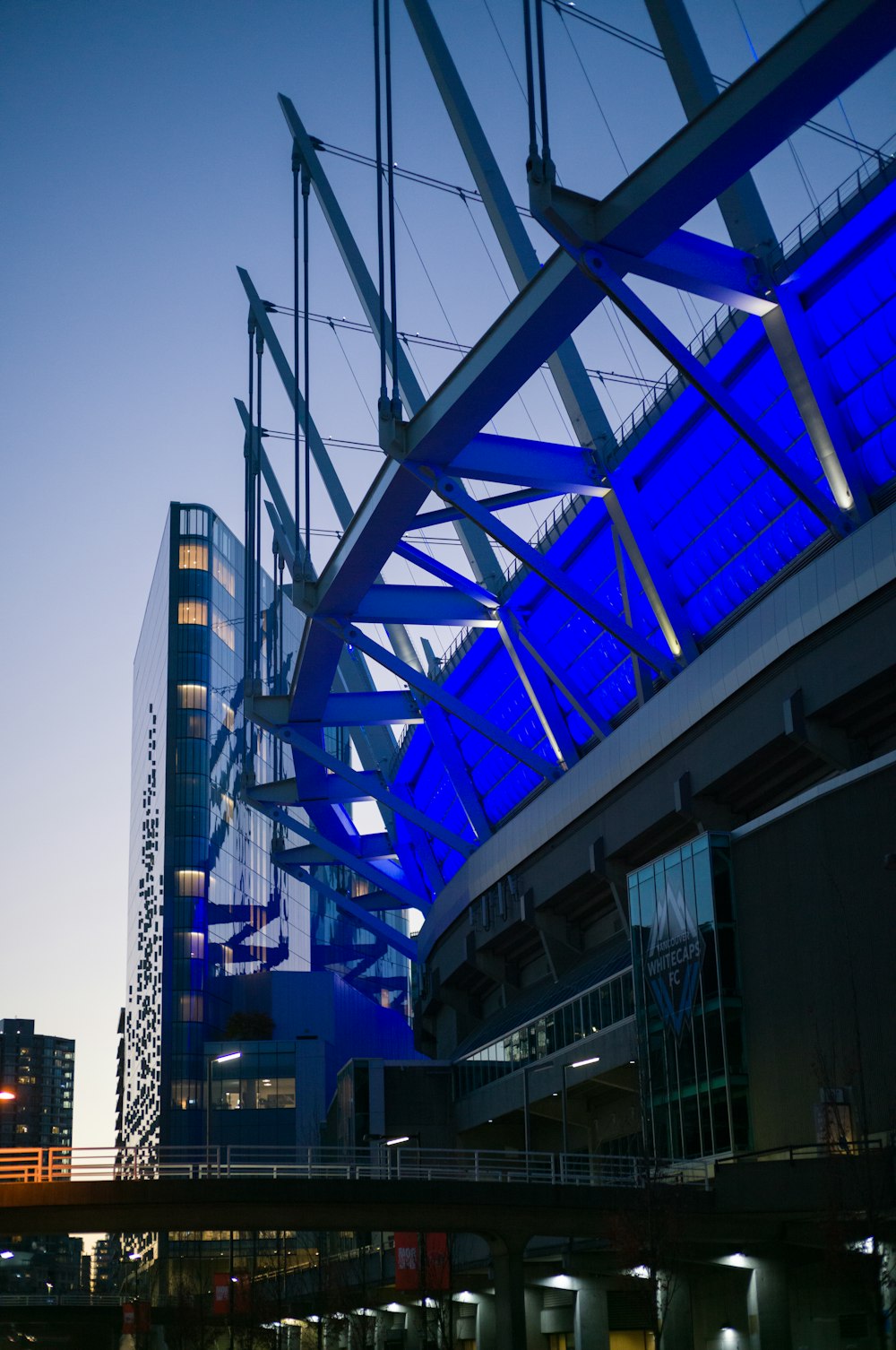 a tall building with a blue sky