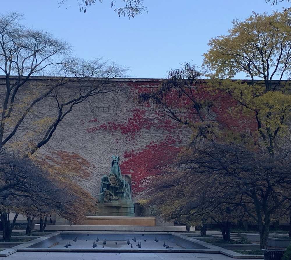 a statue in a park