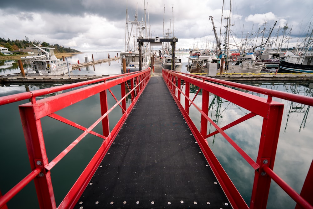 a red bridge with a red railing