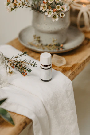 a white candle on a table