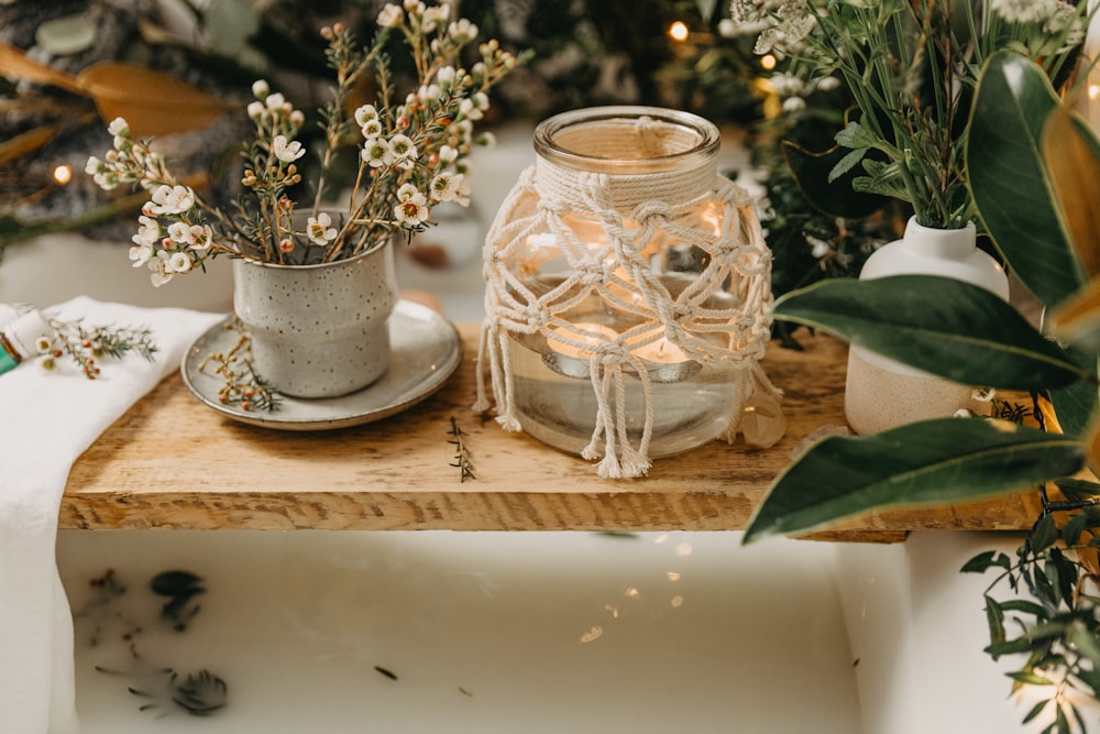 a vase and a cup on a table